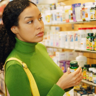 rotato woman shopping for vitamins Vitamins for Hair Growth