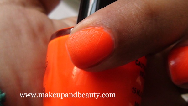 neon orange nail paint