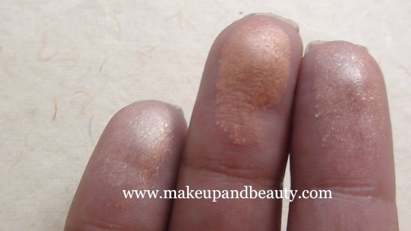 lakme gold dust shimmer bronzer swatch fingers