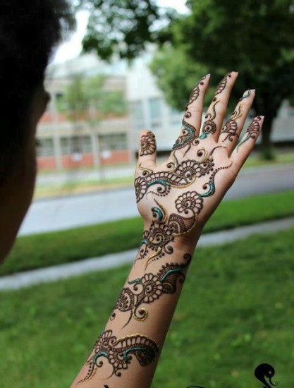Henna tattoo on pregnant belly, closeup Stock Photo - Alamy