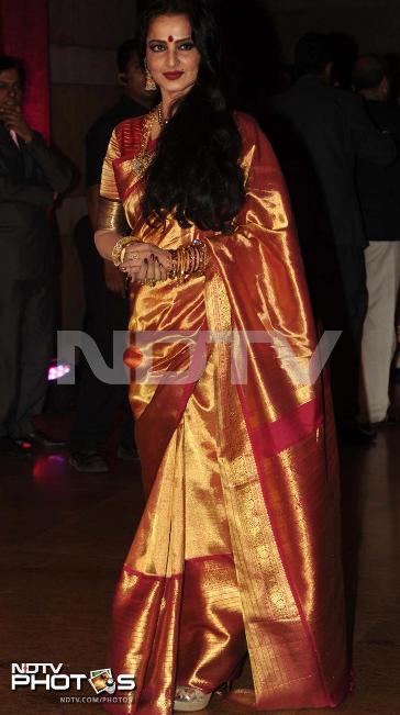 Rekha in golden saree