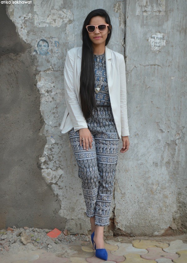 printed jumpsuit with white blazer