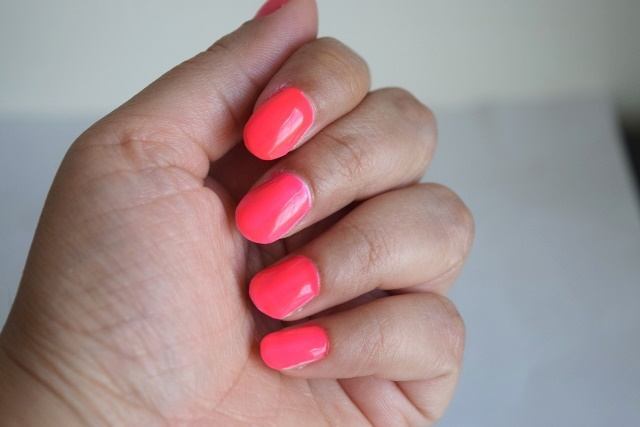 Neon orange nail lacquer