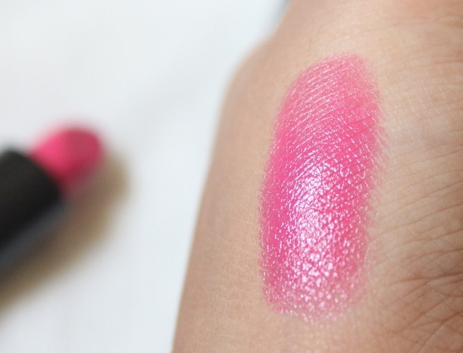 Hot pink lipstick swatch