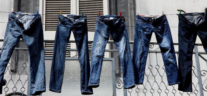 6 Ways You're Ruining Your Jeans3