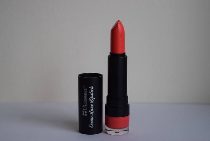 Bright coral lipstick