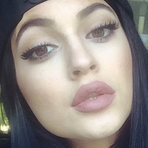 Kylie Jenner with these 8 Holy Grail Makeup Tips