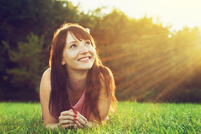 happy woman on grass