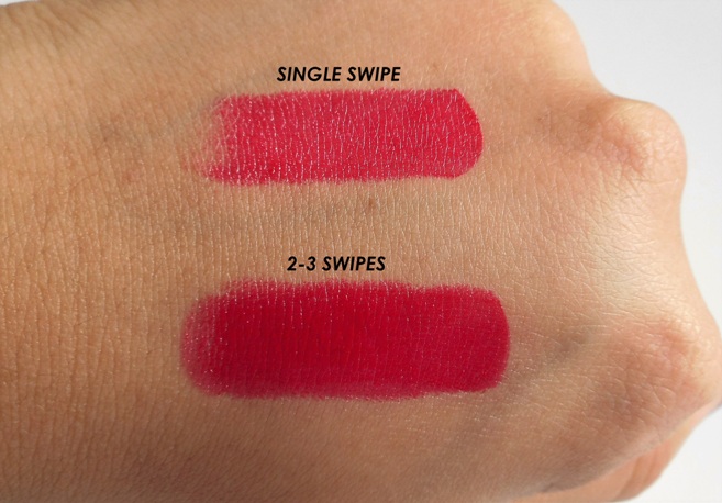 Red lipstick swatch on hands