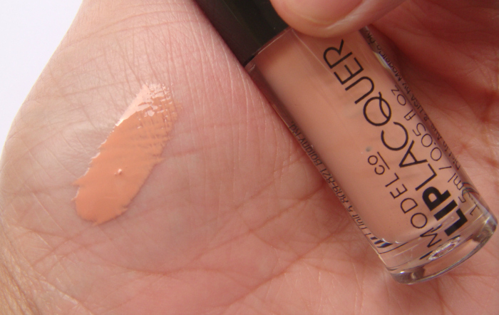 Swatch on hands of modelco creme brulee