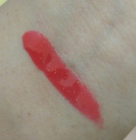 Lotus Herbals Tomato Squash Ecostay Lip Gloss swatch on hands