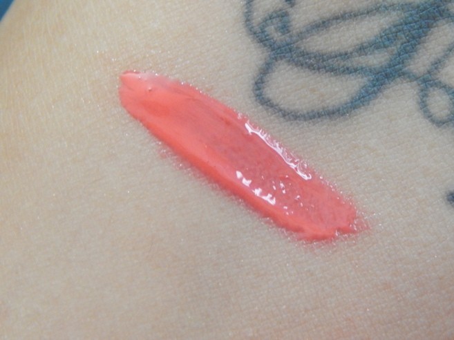 Maybelline Alluring Coral Color Sensational Color Elixir Lip Lacquer swatch on hands