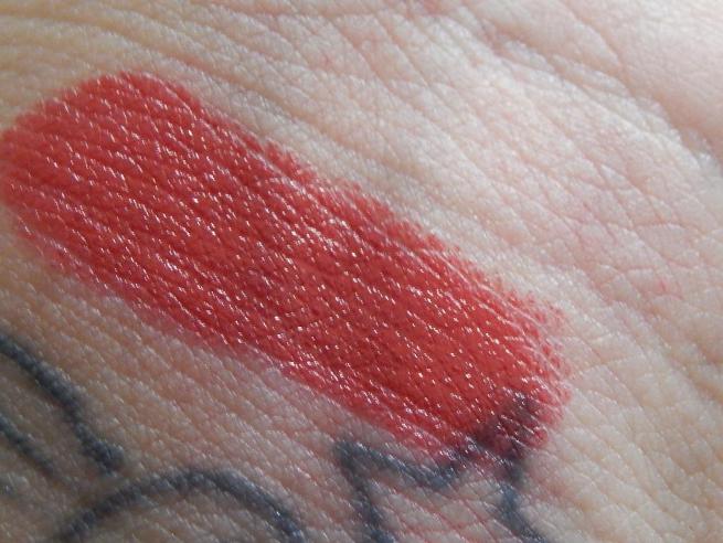 nyc-452-red-suede-expert-last-satin-matte-lip-color-hand-swatch