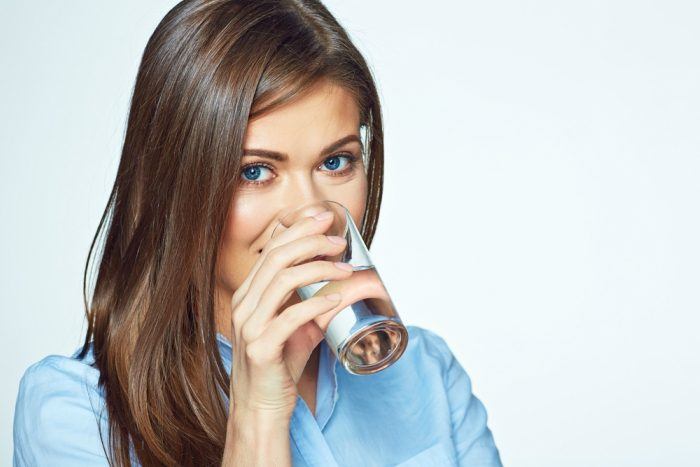 woman-drinking-water-for-clear-skin
