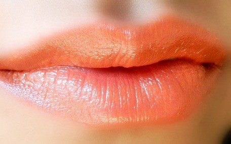 Elle 18 Sunset Orange Color Boost Lipstick lip swatch