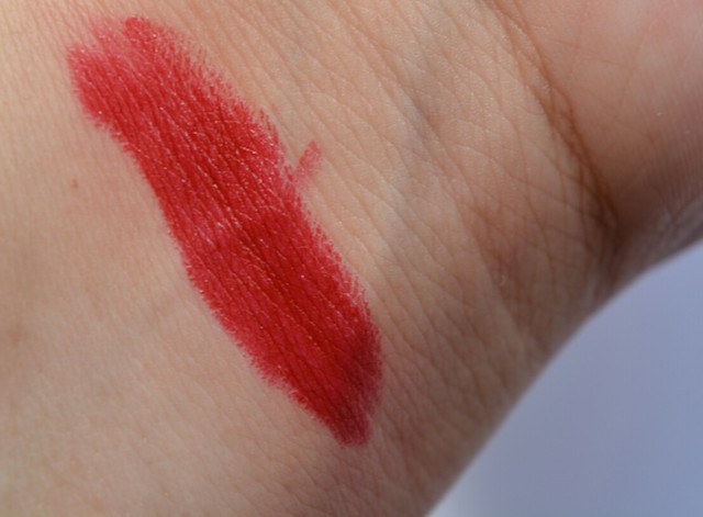 YSL 72 Rouge Vinyle Rouge Pur Couture Lipstick swatch on hands