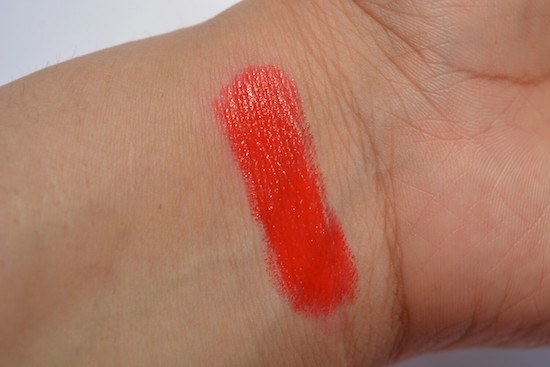 Clio Red Liar Tension Lip swatch on lips