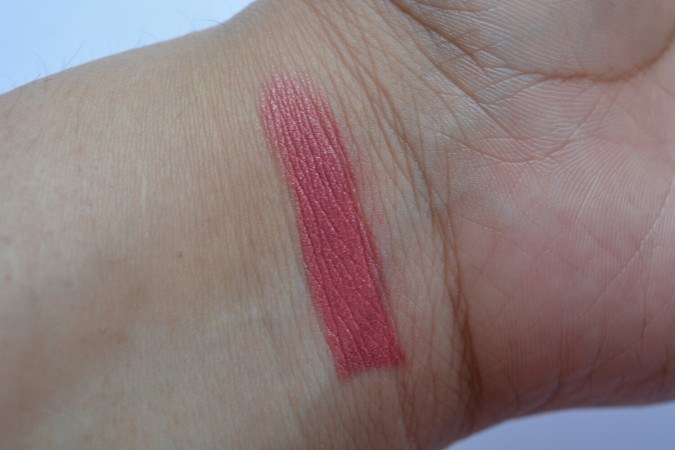 Gucci Nostalgia Audacious Color-Intense Lipstick swatch on hand