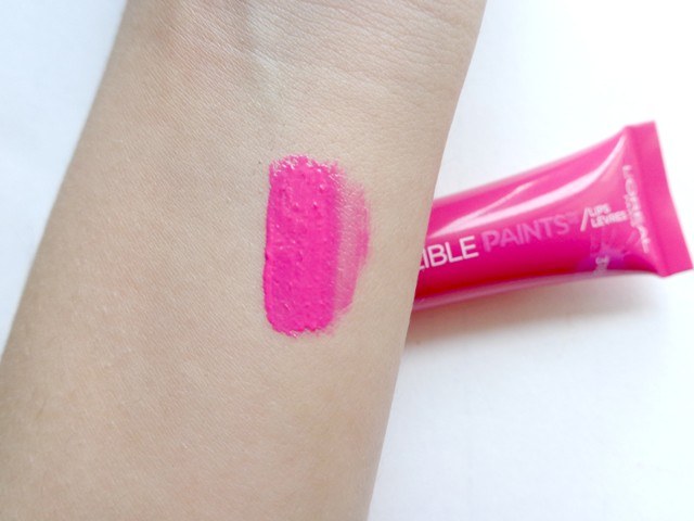 L'Oreal Paris 318 Fearless Fuchsia Infallible Lip Paint swatch on hand