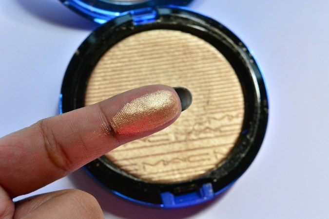 MAC Oh, Darling! Extra Dimension Skinfinish swatch on finger