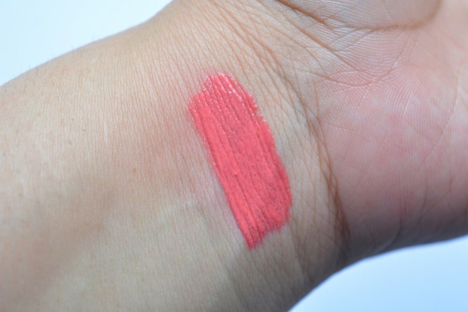 Jill Stuart Gathering Cherries Forever Juicy Oil Rouge swatch on hand