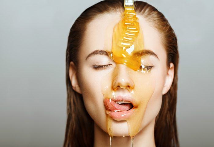 woman with honey on face