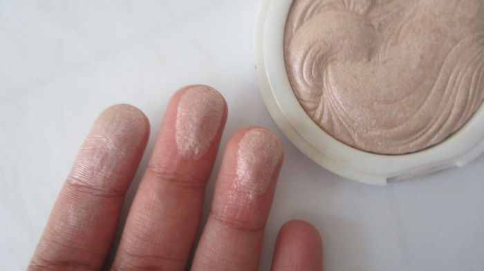 MUA Undress Your Skin Shimmer Highlighter Pink Shimmer swatch on fingers