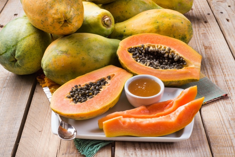 papaya and honey in the plate