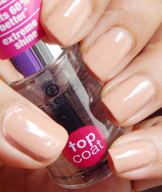 Essence the Gel Nail Polish Top Coat worn on the nails