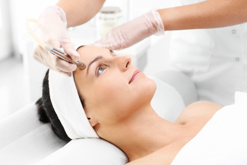 Microdermabrasion. woman during a microdermabrasion treatment in beauty salon