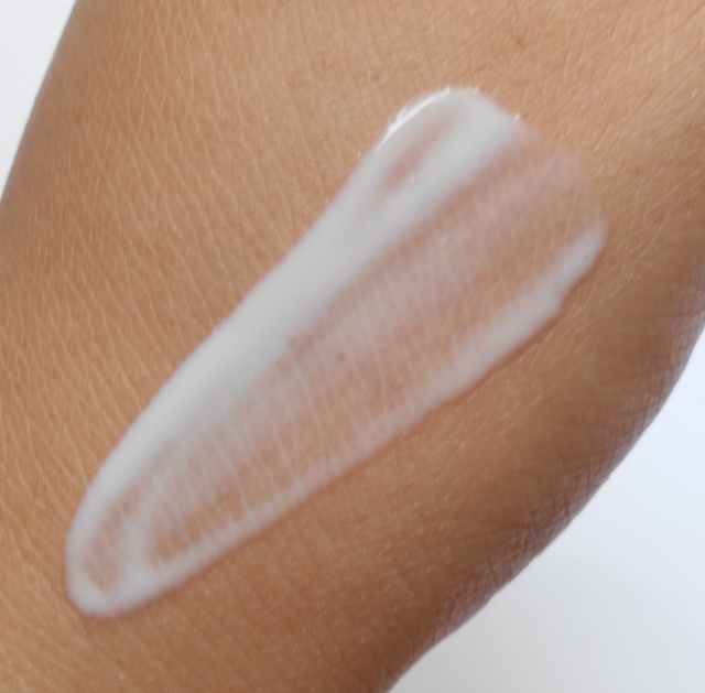 Nivea Extra White Firming Body Serum swatch on hand